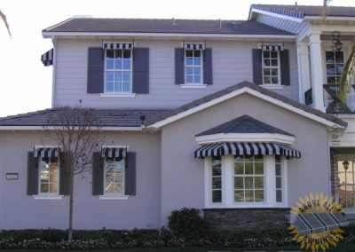 Black and White Striped Spear Awning on Residential Home