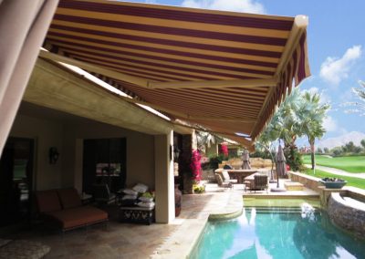 Retractable Awning Over Swimming Pool at Golf Course House