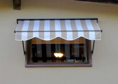 Tan and White Window Awning